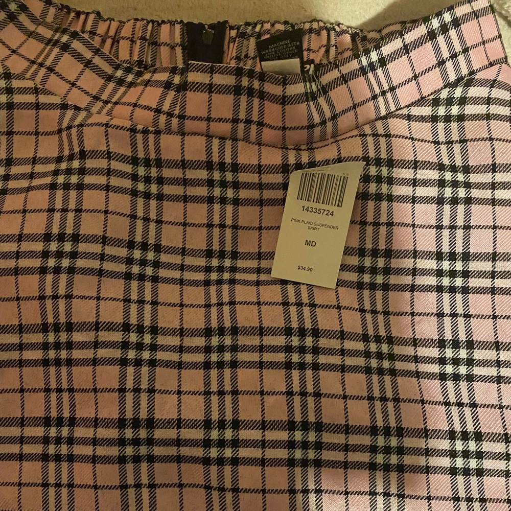 This is a pink skirt I’ve never use it is in good condition.